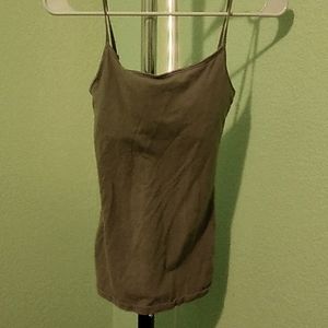 A green tight bodyied tanktop with padding